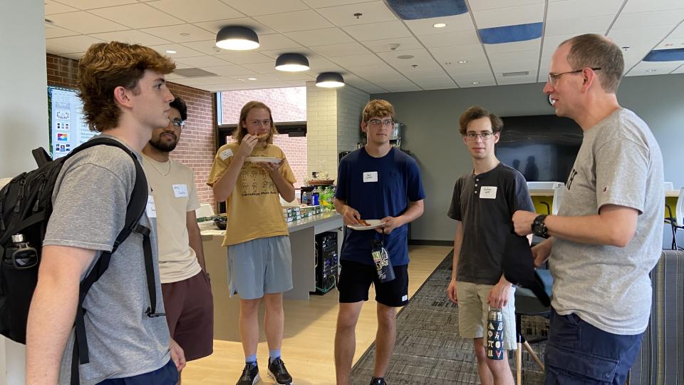 School of Physics Professor Sven Simon greeted some of the new astrophysics majors. 